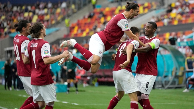 Austria Christoph Baumgartner celebrates