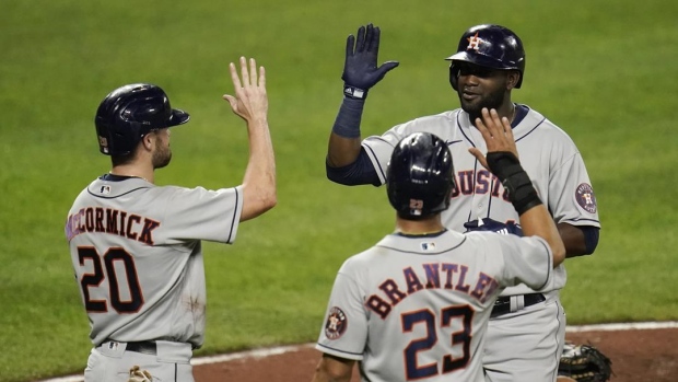 Yordan Alvarez, Chas McCormick and Michael Brantley