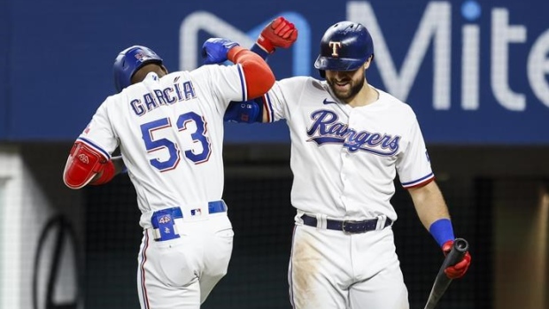 Adolis Garcia Joey Gallo, The Canadian Press Adolis Garcia Joey Gallo