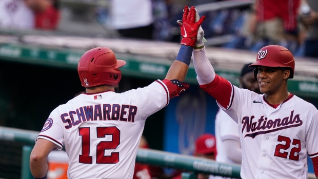 Kyle Schwarber celebrates his solo home run with Juan Soto