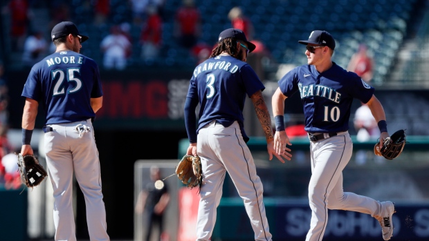 Seattle Mariners' Dylan Moore, J.P. Crawford and Jarred Kelenic, The Canadian Press Seattle Mariners' Dylan Moore, J.P. Crawford and Jarred Kelenic