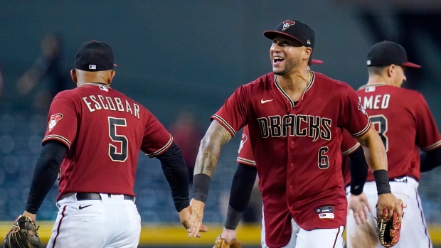 Eduardo Escobar, David Peralta and Nick Ahmed, The Canadian Press Eduardo Escobar, David Peralta and Nick Ahmed