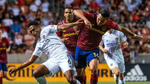 LA Galaxy's Rayan Raveloson and Real Salt Lake forward Rubio Rubin, The Canadian Press LA Galaxy's Rayan Raveloson and Real Salt Lake forward Rubio Rubin