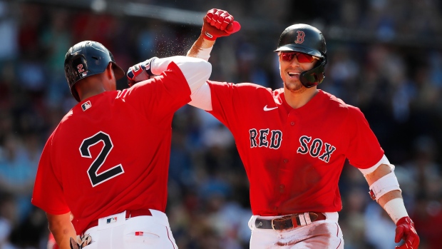 Enrique Hernandez, Xander Bogaerts, The Canadian Press Enrique Hernandez, Xander Bogaerts