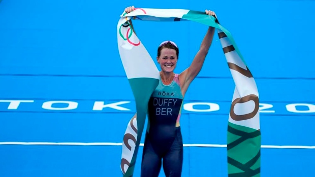 komme til syne Editor Converge Bermuda's Flora Duffy wins triathlon gold - TSN.ca
