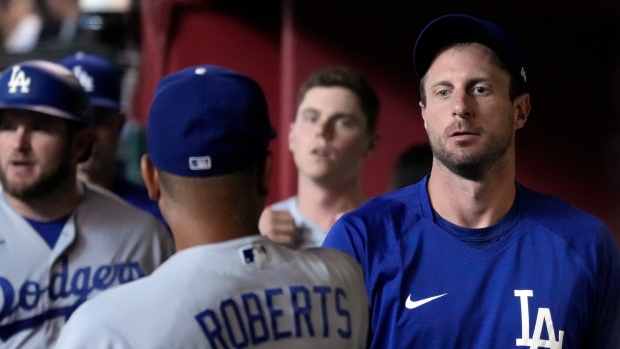 Max Scherzer talks to manager Dave Roberts, The Canadian Press Max Scherzer talks to manager Dave Roberts