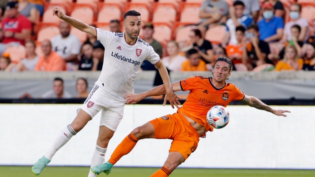 Real Salt Lake forward Justin Meram and Houston Dynamo defender Zarek Valentin, The Canadian Press Real Salt Lake forward Justin Meram and Houston Dynamo defender Zarek Valentin