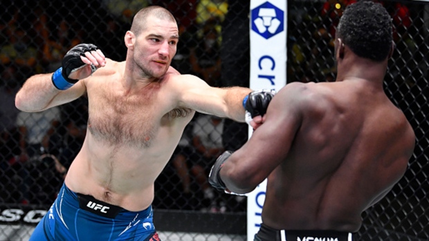 Sean Strickland punches Uriah Hall, Getty Images Sean Strickland punches Uriah Hall