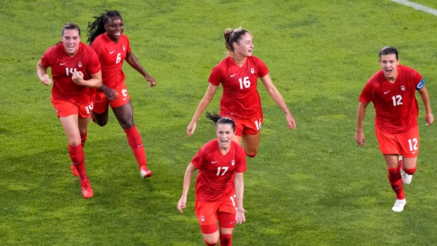 Jessie Fleming and Canada celebrates 