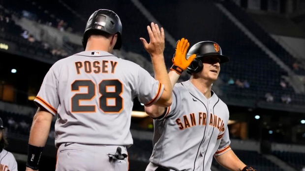 San Francisco Giants' Alex Dickerson and Buster Posey