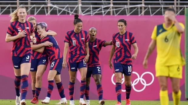 Team USA celebrates, The Canadian Press Team USA celebrates