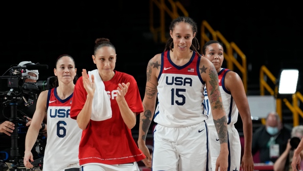 Team USA celebrates, The Canadian Press Team USA celebrates