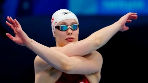 Oleksiak withdraws from world swimming championship with injury