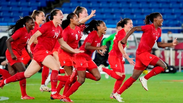 Canada's women's soccer team celebrates