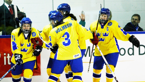 Cecilia Ostberg, Sweden celebrate, HHOF Images on Ice Cecilia Ostberg, Sweden celebrate
