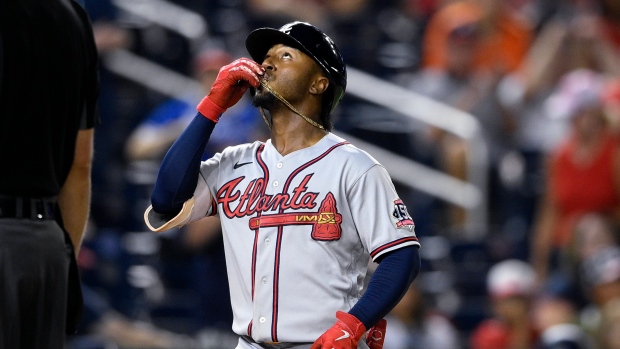 File:Ozzie Albies walks away from celebrating Nationals from