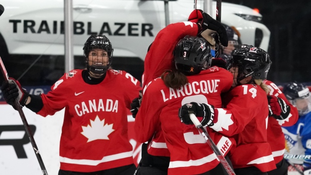 Team Canada celebrates, Images on Ice Team Canada celebrates
