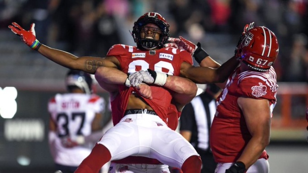 Calgary Stampeders celebrate, Candice Ward//Calgary Stampeders on Twitter Calgary Stampeders celebrate