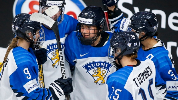 Petra Nieminen and Finland celebrate, The Canadian Press Petra Nieminen and Finland celebrate