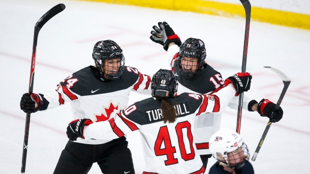 Team Canada celebrates, The Canadian Press Team Canada celebrates
