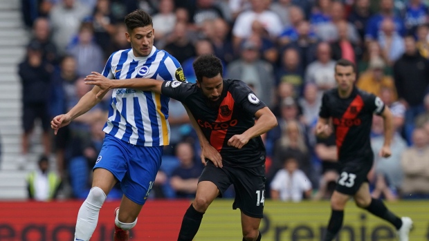 Jakub Moder, left, Andros Townsend, The Canadian Press Jakub Moder, left, Andros Townsend