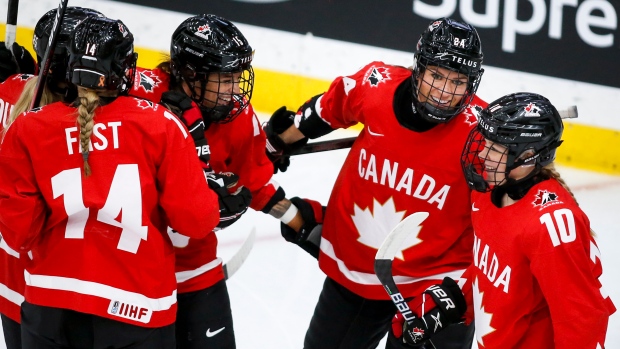 Natalie Spooner Team Canada celebrates, The Canadian Press Natalie Spooner Team Canada celebrates