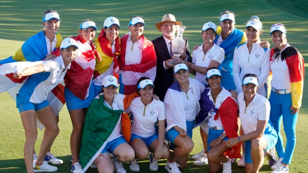 Team Europe poses after they defeated the United States at the Solheim Cup golf tournament, The Canadian Press Team Europe poses after they defeated the United States at the Solheim Cup golf tournament