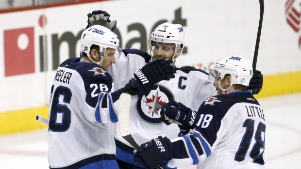 Wheeler, Little, Ladd celebrate, The Canadian Press Wheeler, Little, Ladd celebrate