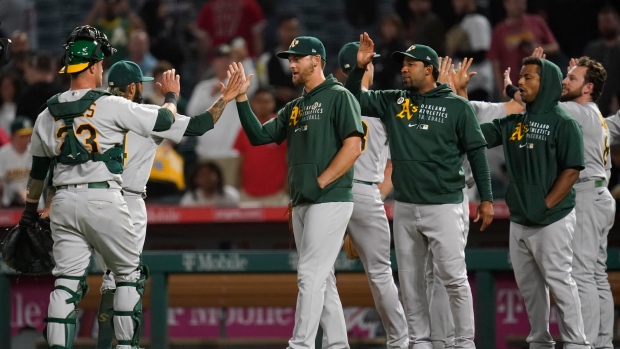 Oakland A's celebrate, The Canadian Press Oakland A's celebrate