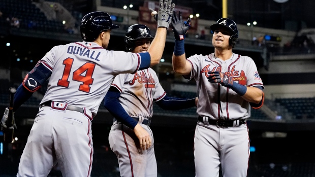 Adam Duvall, Austin Riley, The Canadian Press Adam Duvall, Austin Riley