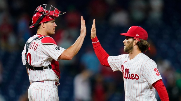 J.T. Realmuto, Bryce Harper, The Canadian Press J.T. Realmuto, Bryce Harper