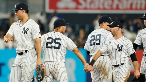 New York Yankees celebrate, The Canadian Press New York Yankees celebrate