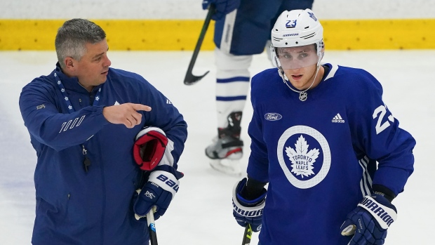 Sheldon Keefe, Travis Dermott, The Canadian Press Sheldon Keefe, Travis Dermott