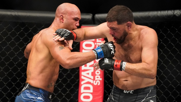 Robbie Lawler, Nick Diaz, The Canadian Press Robbie Lawler, Nick Diaz