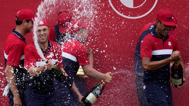 USA players celebrate after the Ryder Cup