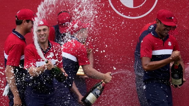 USA players celebrate after the Ryder Cup, The Canadian Press USA players celebrate after the Ryder Cup