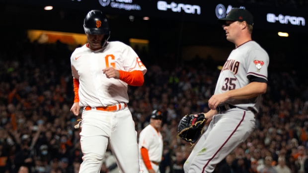 Buster Posey Scores 