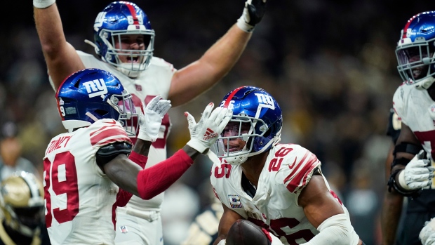 Saquon Barkley, Kadarius Toney, The Canadian Press Saquon Barkley, Kadarius Toney