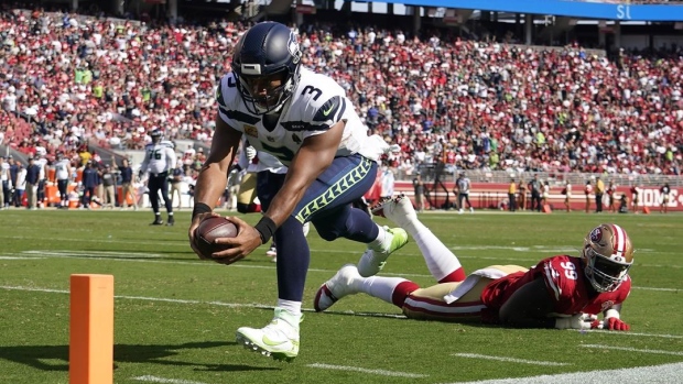 Russell Wilson, The Canadian Press Russell Wilson