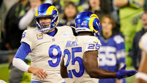 Matthew Stafford and Sony Michel , The Canadian Press Matthew Stafford and Sony Michel