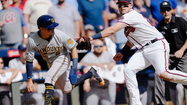 Austin Riley Luis Urias, The Canadian Press Austin Riley Luis Urias