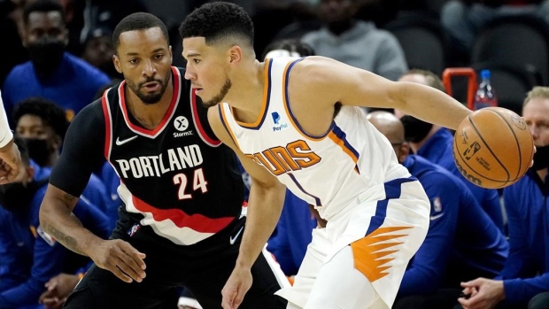 Devin Booker Norm Powell, The Canadian Press Devin Booker Norm Powell