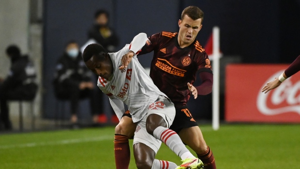 Toronto FC's Richie Laryea and Atlanta United's Amar Sejdic