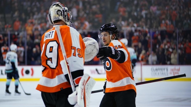 Carter Hart celebrates