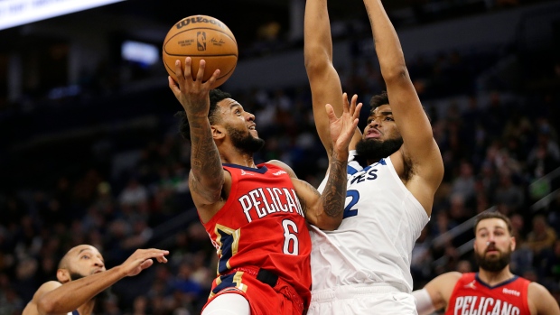 Nickeil Alexander-Walker Karl-Anthony Towns , The Canadian Press Nickeil Alexander-Walker Karl-Anthony Towns