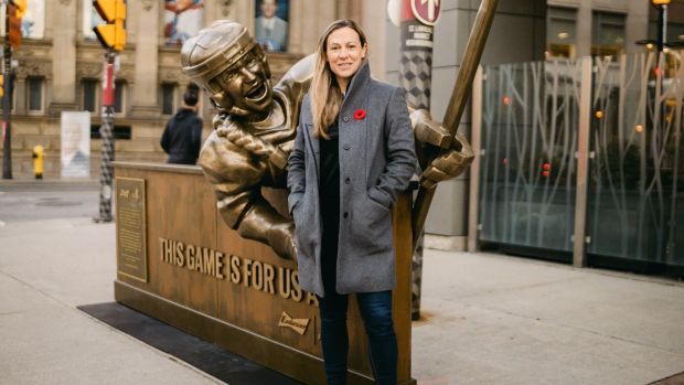 Jayna Hefford with "This Game is For Us All" monument