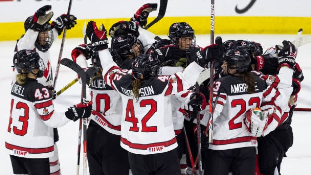 Team Canada celebrates 