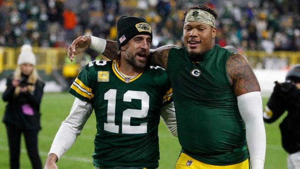 Aaron Rodgers and Preston Smith, The Canadian Press Aaron Rodgers and Preston Smith