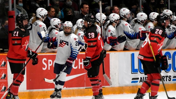 Team USA celebrates, The Canadian Press Team USA celebrates