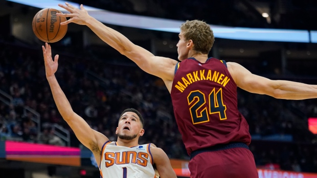 Devin Booker Lauri Markkanen, The Canadian Press Devin Booker Lauri Markkanen